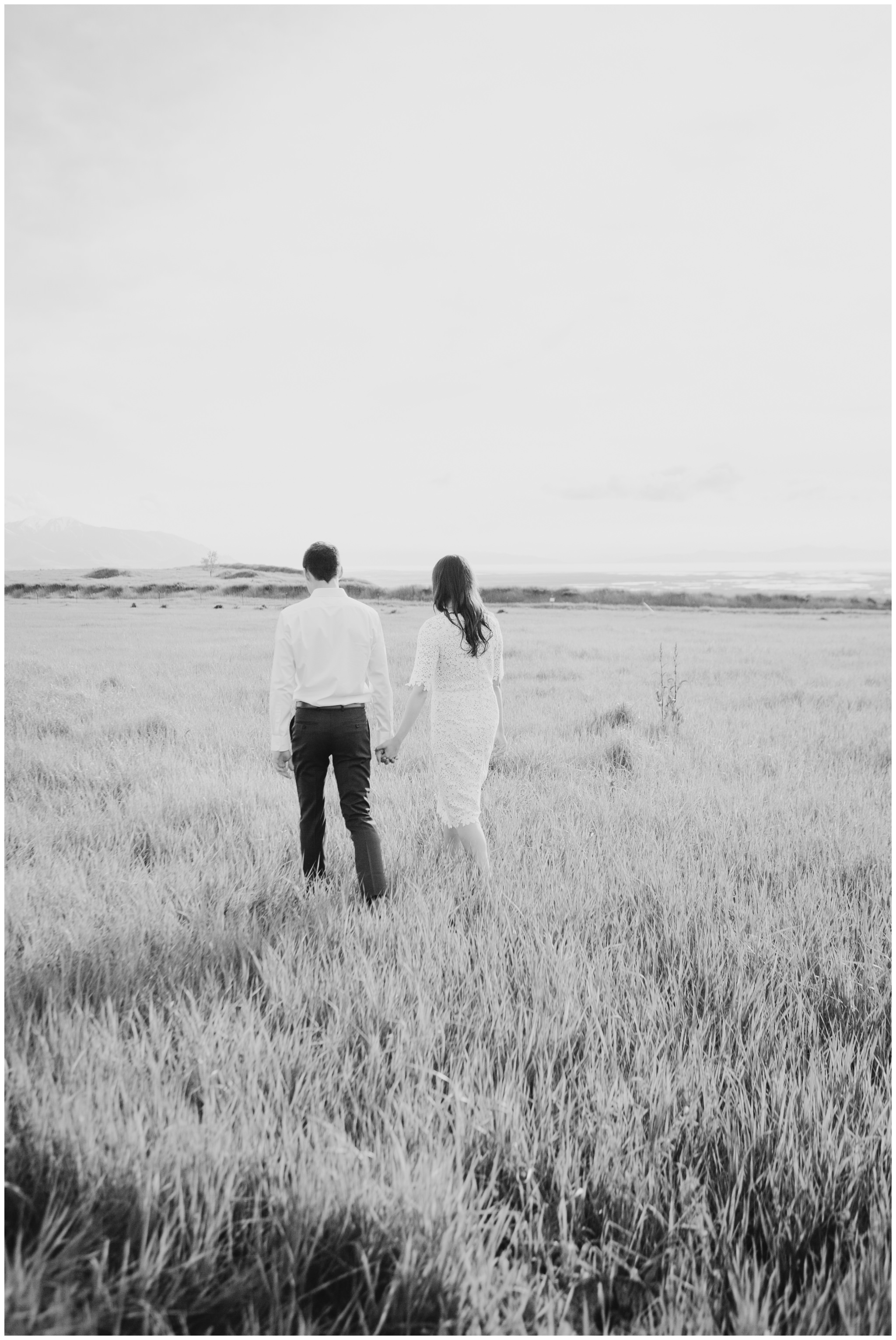 Black and White image of couple walking away together