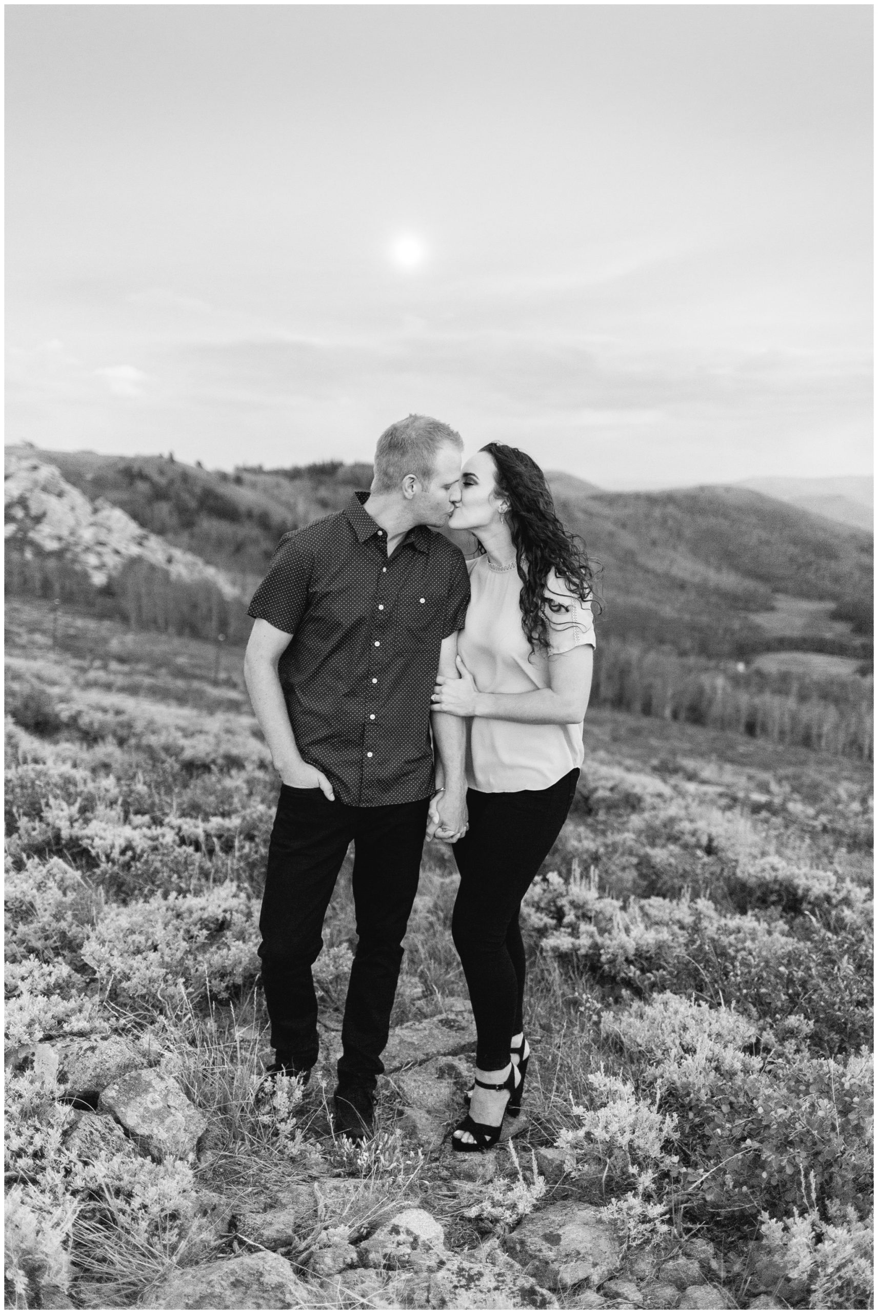Black and white photo of couple kissing for Engagement photos in Park City Utah