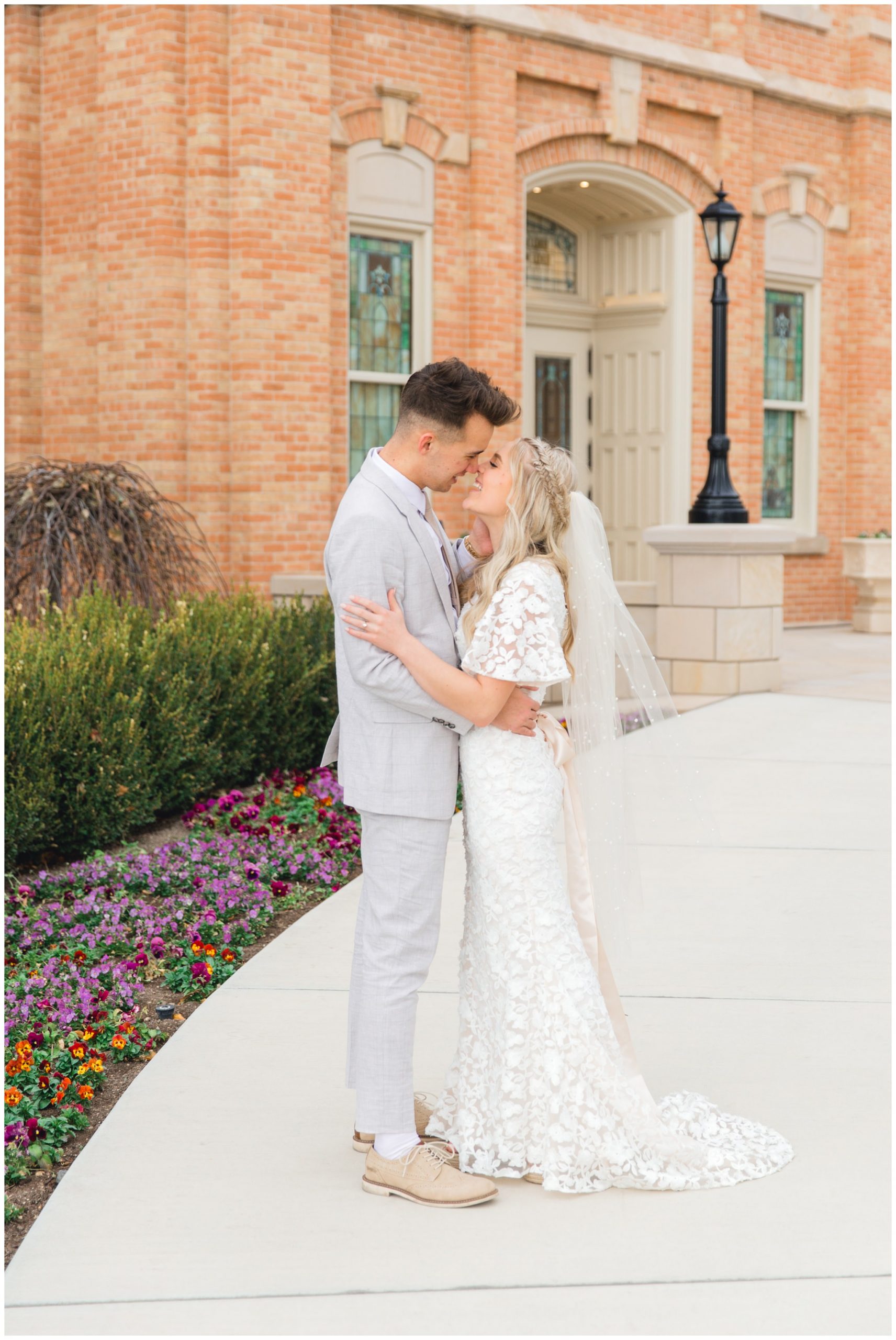 Bride and groom kissing at the Provo City Center Temple 