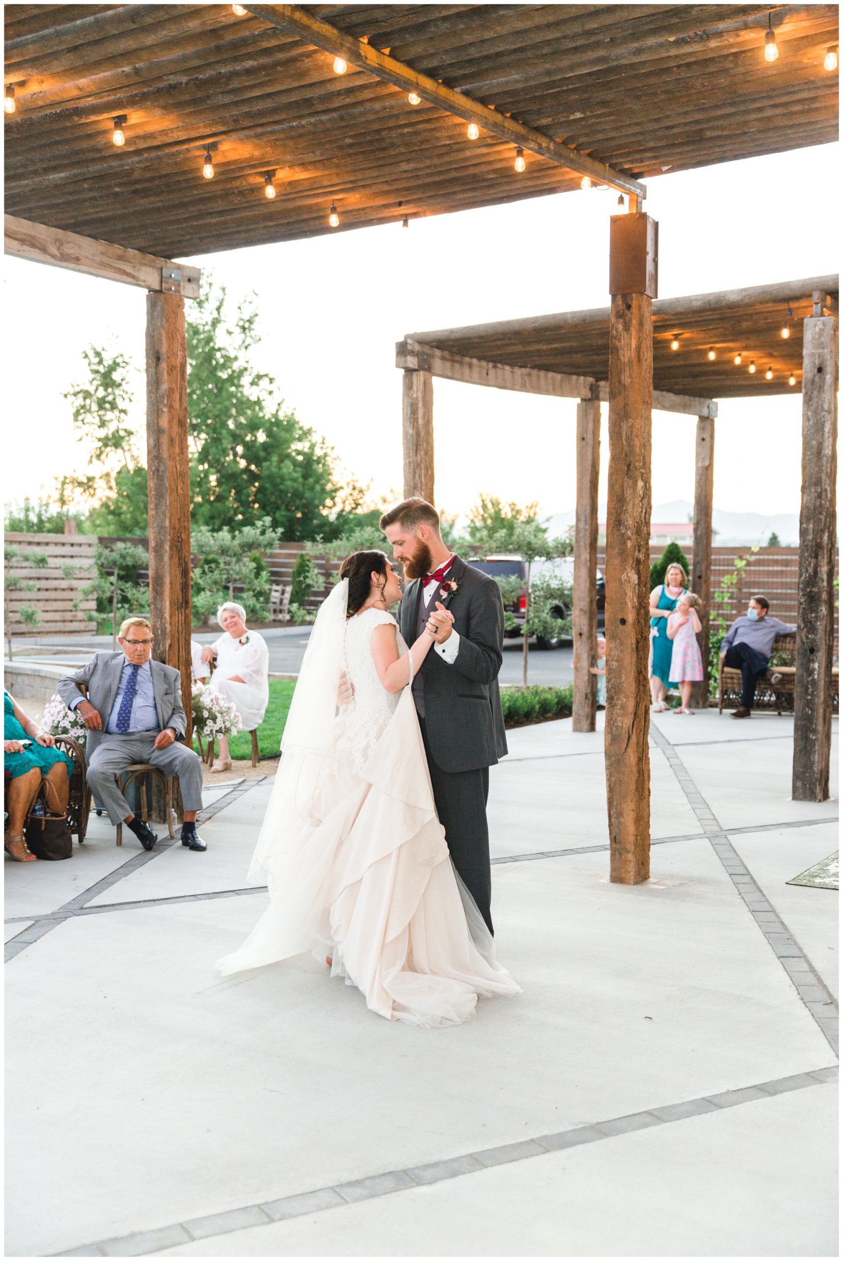 Bride and groom sharing their first dance as husband and wife at their wedding reception in Lindon Utah