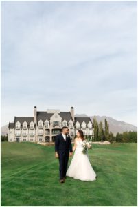 Bride and Groom in front of the Sleepy Ridge Wedding Venue in Vineyard Utah