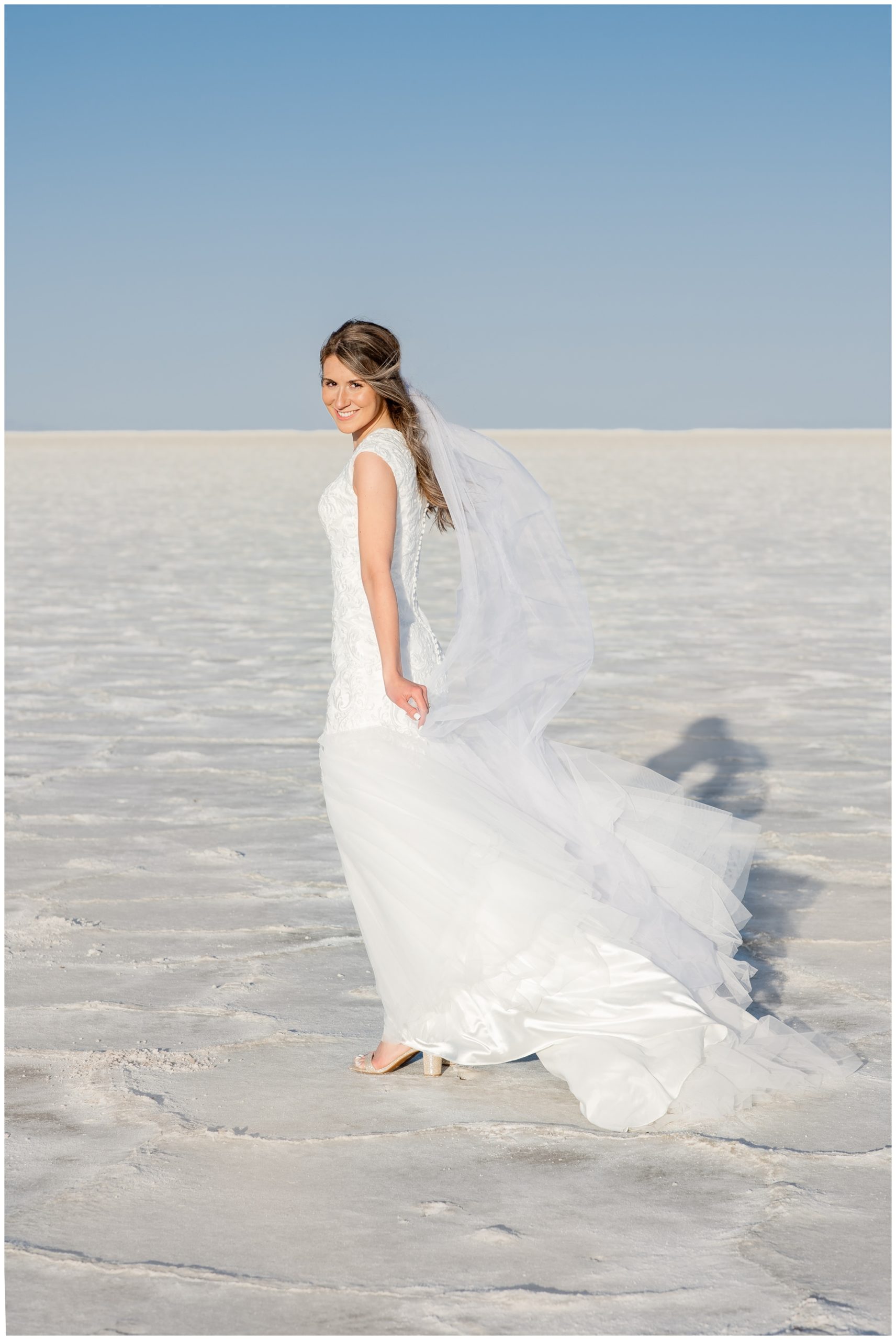 Bride holding veil at the Boneville Salt Flats